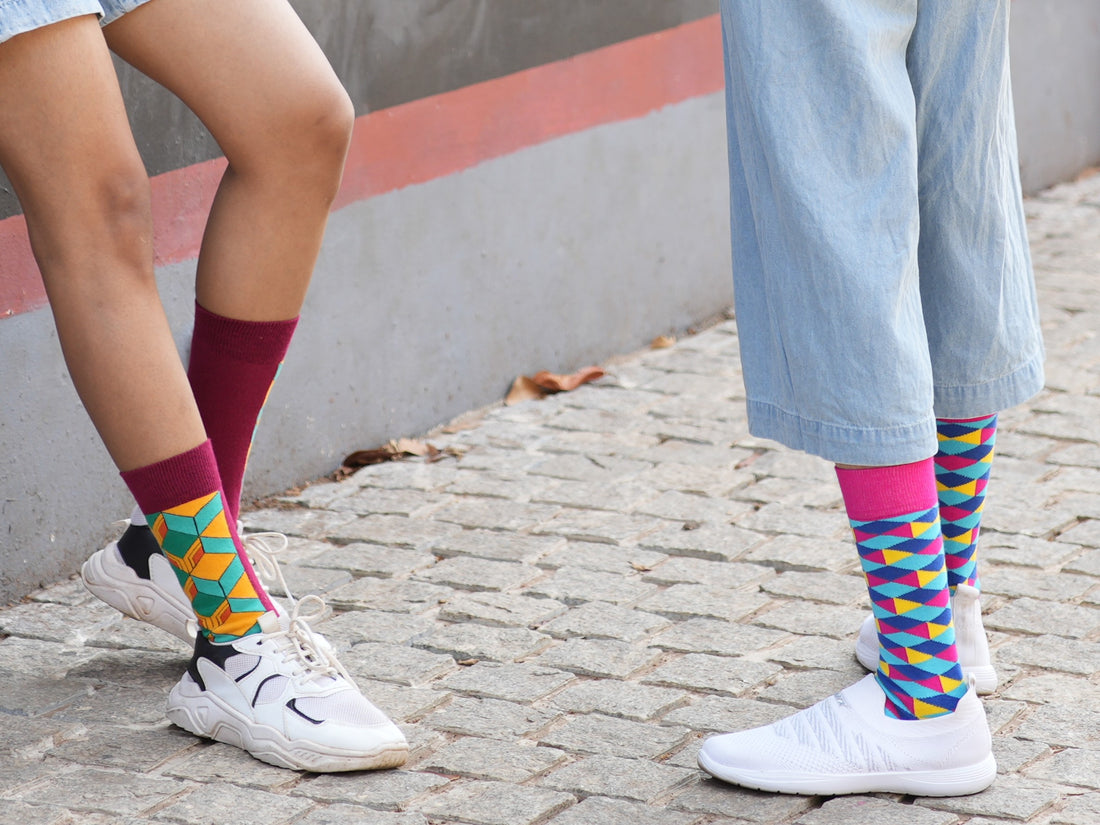 picture of two legs with cool funky designer fashion socks